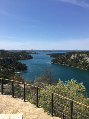 The Krka river winding toward the sea, seen from the highway overlook coming down from Zagreb
